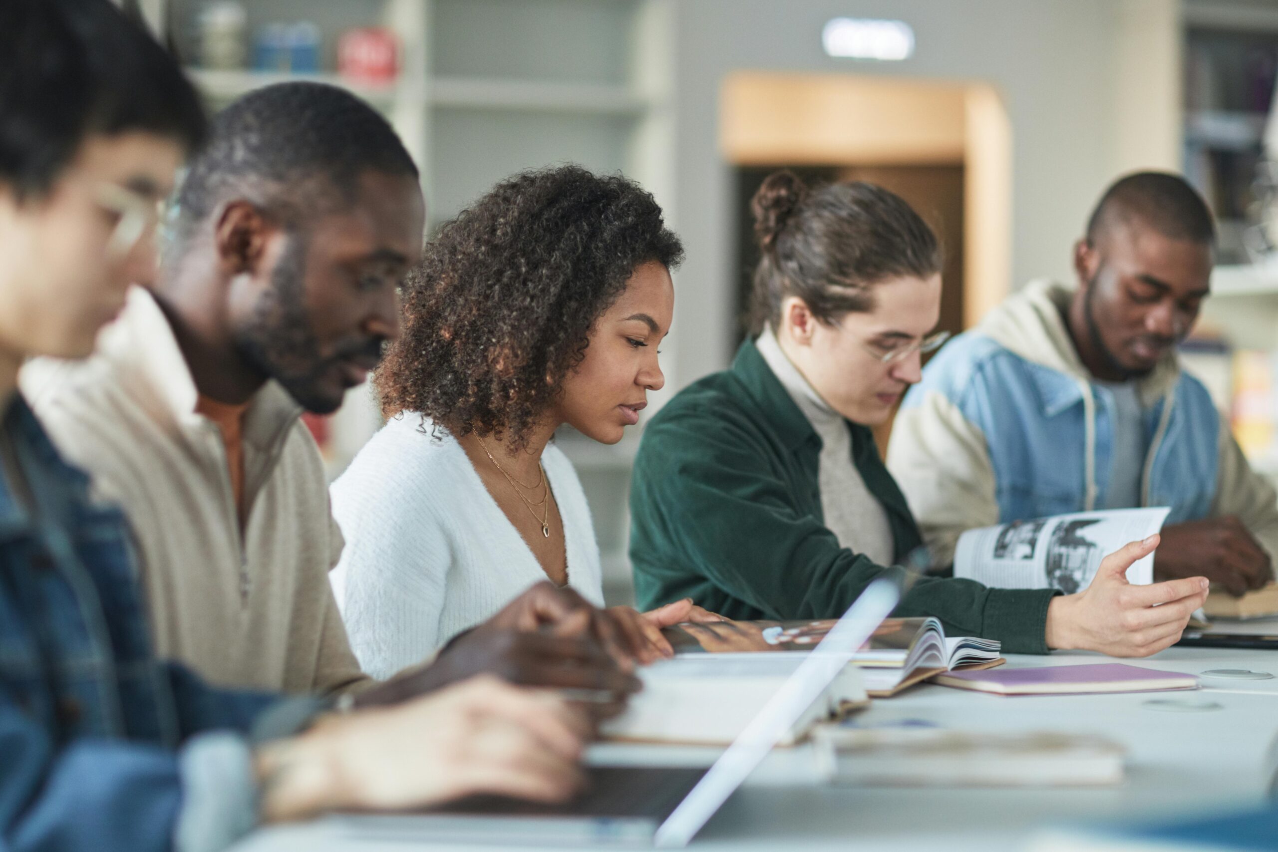 A Group of Students Studying in the Library