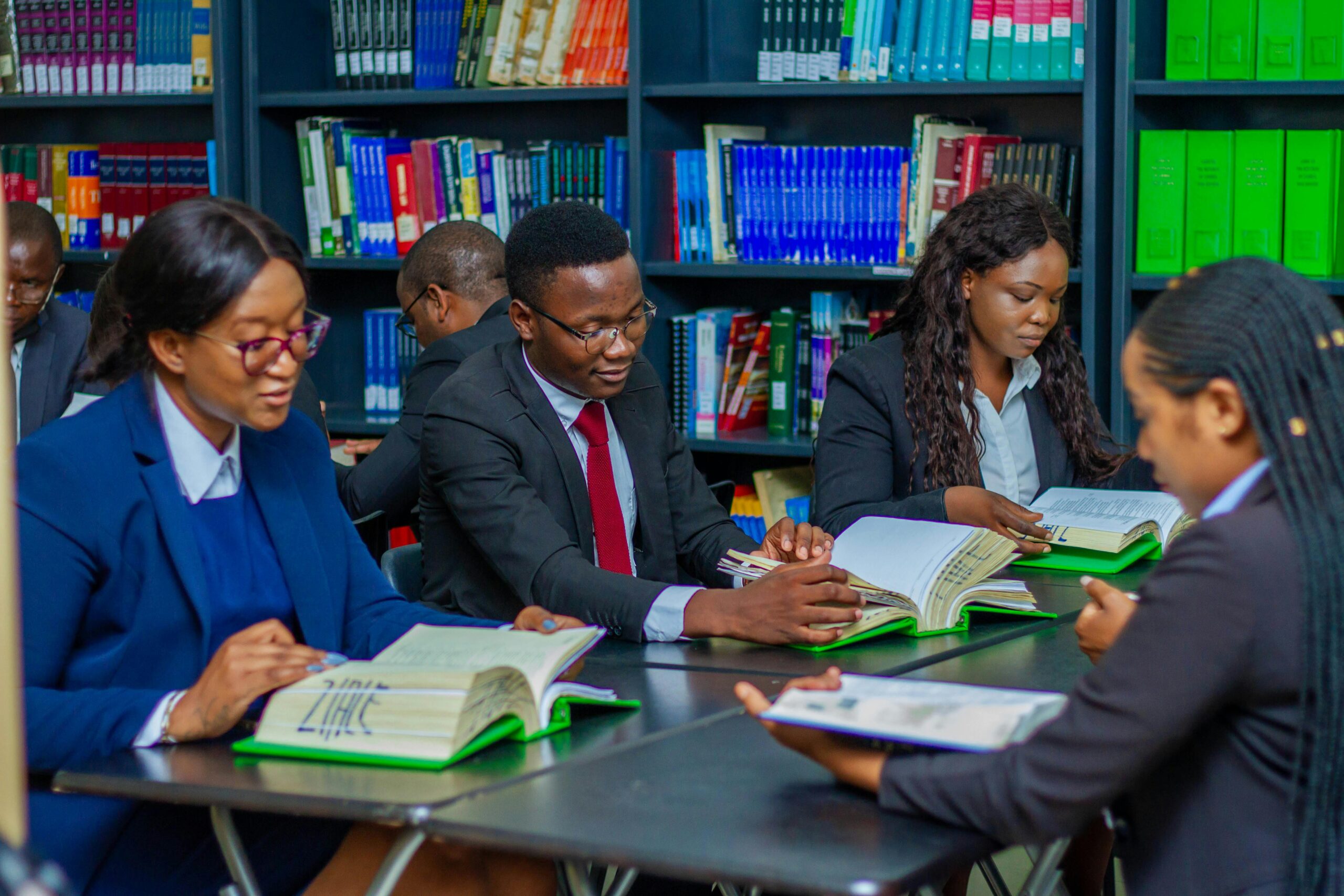 Students on the Table Reading Books