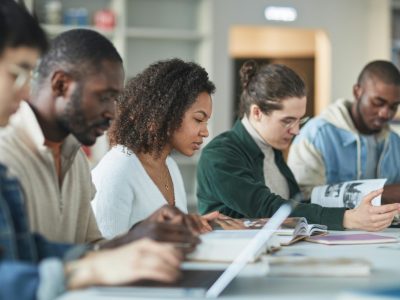 A Group of Students Studying in the Library