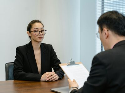 A lady who applied for a visa sitting for her visa interview with a male visa officer