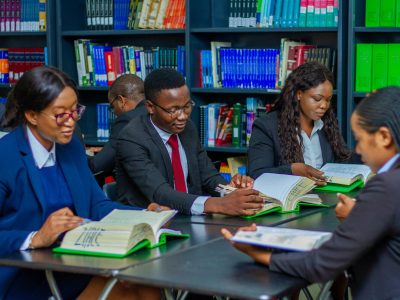 Students on the Table Reading Books